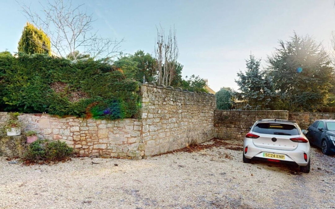 Planning Permission For A Double Garage Within the Setting of a Listed Feature